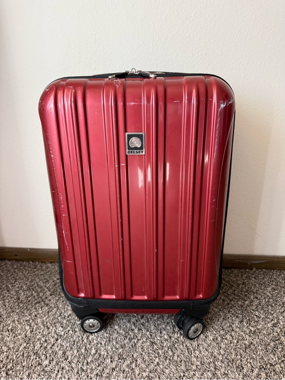 Delsey Red Hardside Expandable Rolling Suitcase